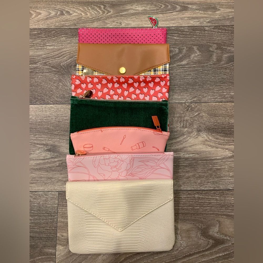 Ipsy cosmetic bags. Lot of 7. Clean, like new.